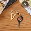 Royal Enfield ROYAL ENFIELD Bottle Opener Multi-Tool Keychain - Antique Brass | re_RLCKCS230149 | euronetbike-net Royal Enfield ROYAL ENFIELD Bottle Opener Multi-Tool Keychain - Antique Brass | re_RLCKCS230149 | euronetbike-net