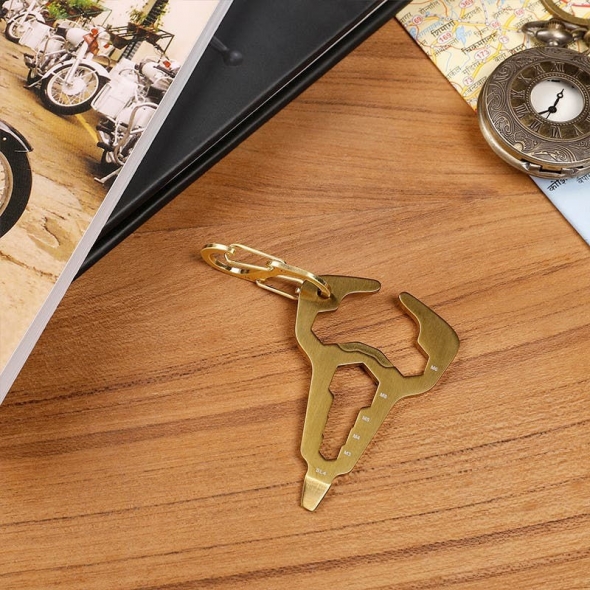 Royal Enfield ROYAL ENFIELD Bottle Opener Multi-Tool Keychain - Antique Brass | re_RLCKCS230149 | euronetbike-net Royal Enfield ROYAL ENFIELD Bottle Opener Multi-Tool Keychain - Antique Brass | re_RLCKCS230149 | euronetbike-net